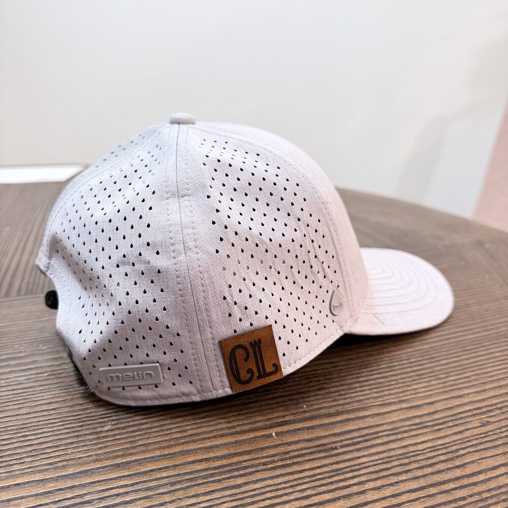 Close-up of a custom-decorated cap finished at the hat bar